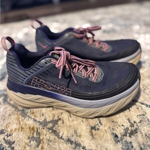 Hoka Women's Purple and Pink Athletic Shoes with tan bottoms